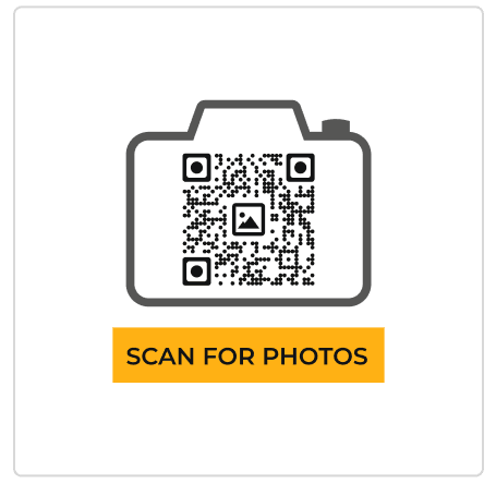 Example of an eye-catching camera-shaped QR code with ‘SCAN FOR PHOTOS’ text, generated with Scanova.